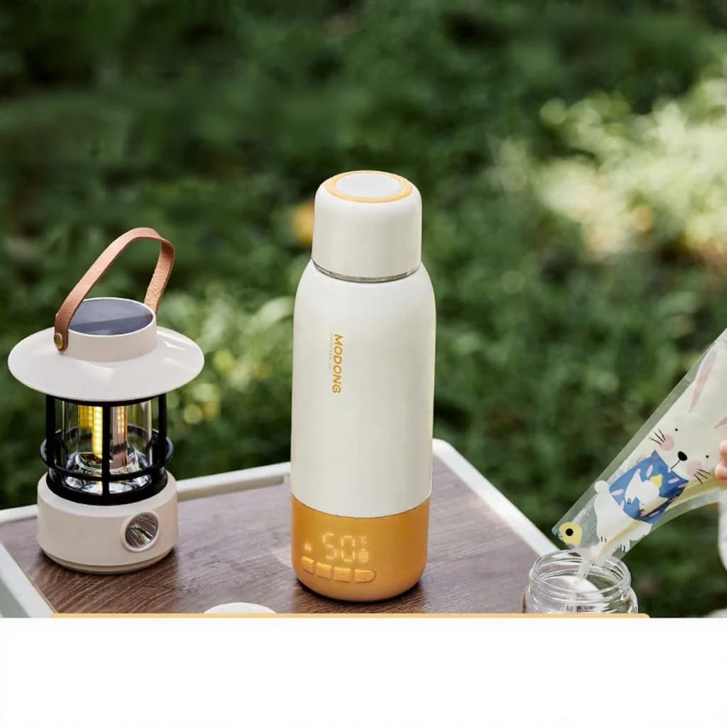 Tragbarer Babyflaschen-Wärmebecher 550 ml Ultra, Netzbetriebenes Kochen + Kabelloses Warmhalten